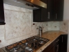 16-custom-2x4-tumbled-travertine-with-glass-tile-back-splash-tampa-sarasota-brandon-bradenton-lutz-wesley-chapel-new-port-richey-oldsmar-florida-install-installer-installatio