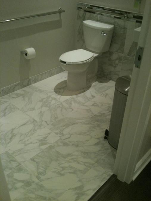9x18 Calacatta marble tile bathroom restroom installation Tampa, florida