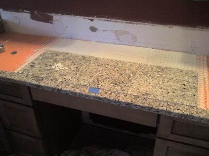 c9-Granite-Tile-Counter-with-a-Travertin